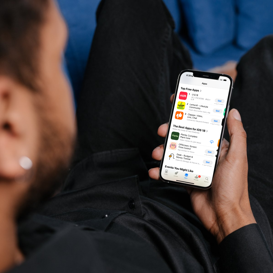 Man looking at RedNote Top App in Apple Store